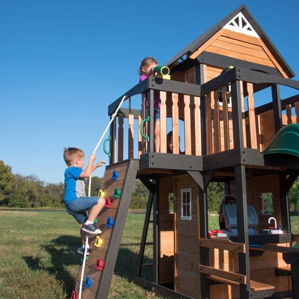 Backyard Discovery Canyon Creek Cedar Wood Playset Swing Set with Wave Slide Rock Climbing Wall and Lower Playhouse